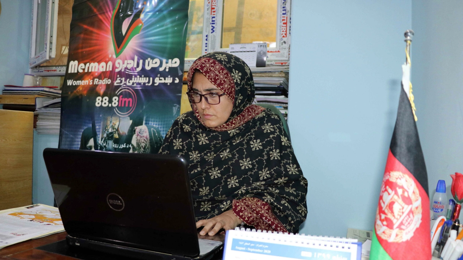 Women in Kandahar, radio station.