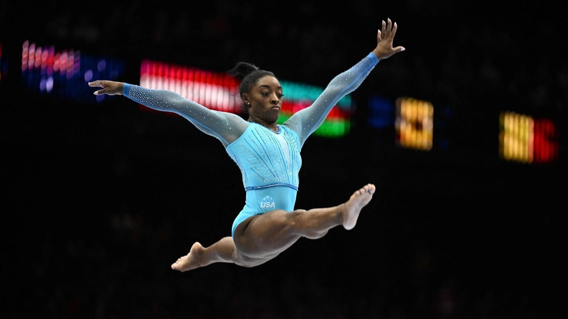 Simone Biles, nata in Brasile nel 1997, due volte campionessa olimpica all-around, l'unica ad aver conquistato il titolo in due Olimpiadi non consecutive.