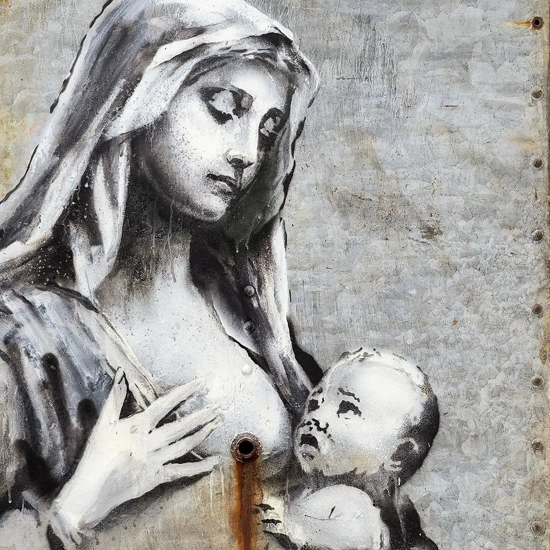 Banksy, la Madonna con bambino: cosa si nasconde dietro l’opera?