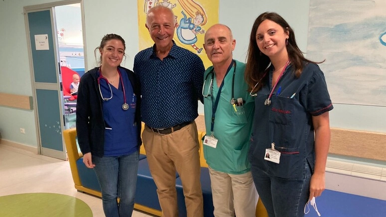 Gianfranco Gallo insieme all'equipe medica di Palermo