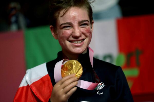 Italy's Beatrice Vio with her gold medal after winning the wheelchair fencing women's foil individual category B during the Tokyo 2020 Paralympic Games at Makuhari Messe Hall in Chiba on August 28, 2021. (Photo by Behrouz MEHRI / AFP)
