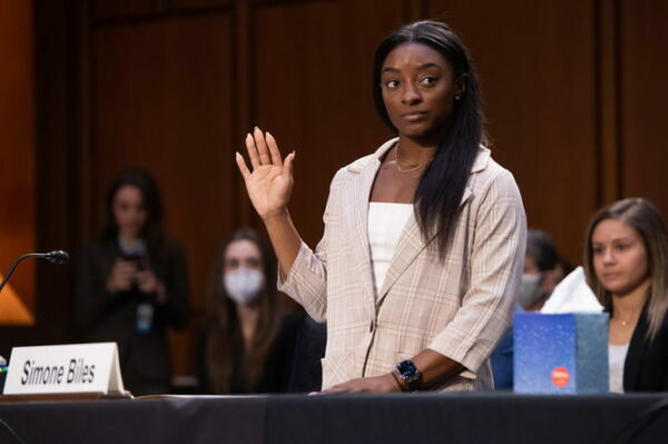 epa09470326 US Olympic gymnasts Simone Biles is sworn in to testify during a Senate Judiciary hearing about the Inspector General's report on the FBI handling of the Larry Nassar investigation of sexual abuse of Olympic gymnasts, on Capitol Hill in Washington, DC, USA, 15 September 2021.  EPA/SAUL LOEB / POOL
