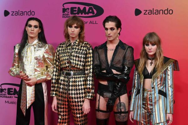 Italian rock band Maneskin pose on the red carpet as they arrive for the MTV Europe Music Awards at the Laszlo Papp Budapest Sports Arena in Budapest, Hungary on November 14, 2021. (Photo by Attila KISBENEDEK / AFP)